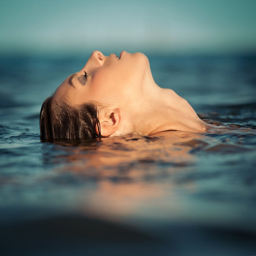 Sensual Woman Emerging from the Water